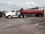 Freightliner and end dump trailer.JPG